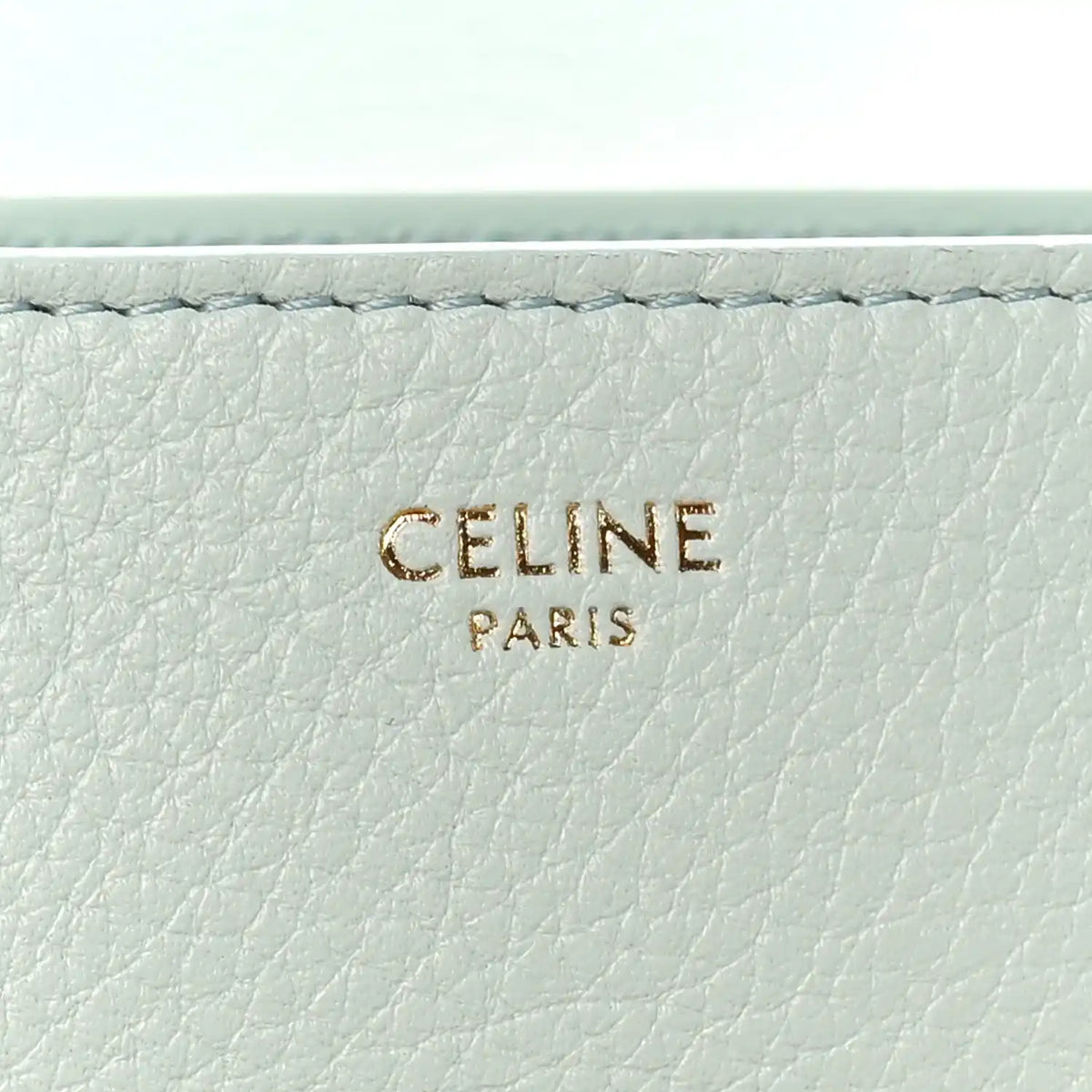 Celine Paris embossing on light blue grained leather lining