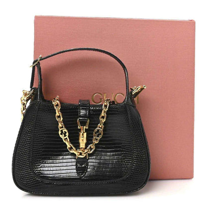 Gucci lizard mini Jackie handbag in black exotic leather, gold chain strap, front clasp