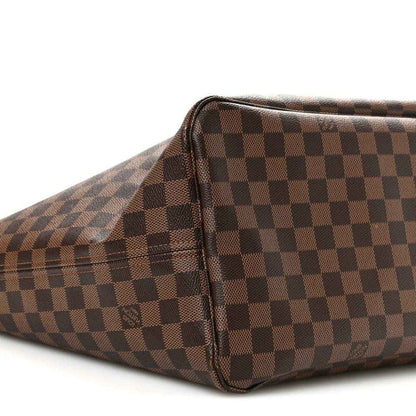 Damier Ebene canvas tote bag close-up of side panel with dark trim and stitched seam