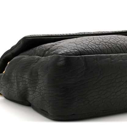 Saint Laurent Calypso shoulder bag, black grained lambskin, side profile