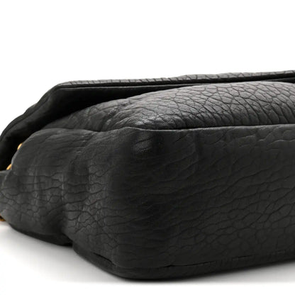 Saint Laurent Calypso shoulder bag, black grained lambskin, side profile