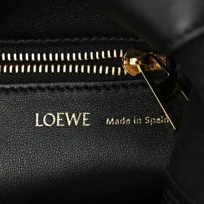 LOEWE nappa leather zipper close-up with gold pull and stitching