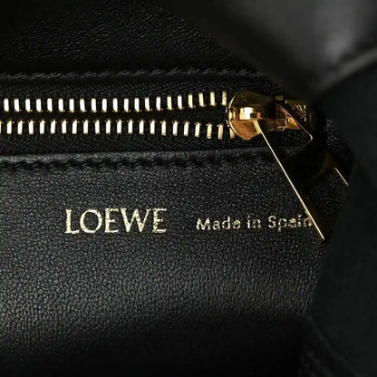 LOEWE nappa leather zipper close-up with gold pull and stitching