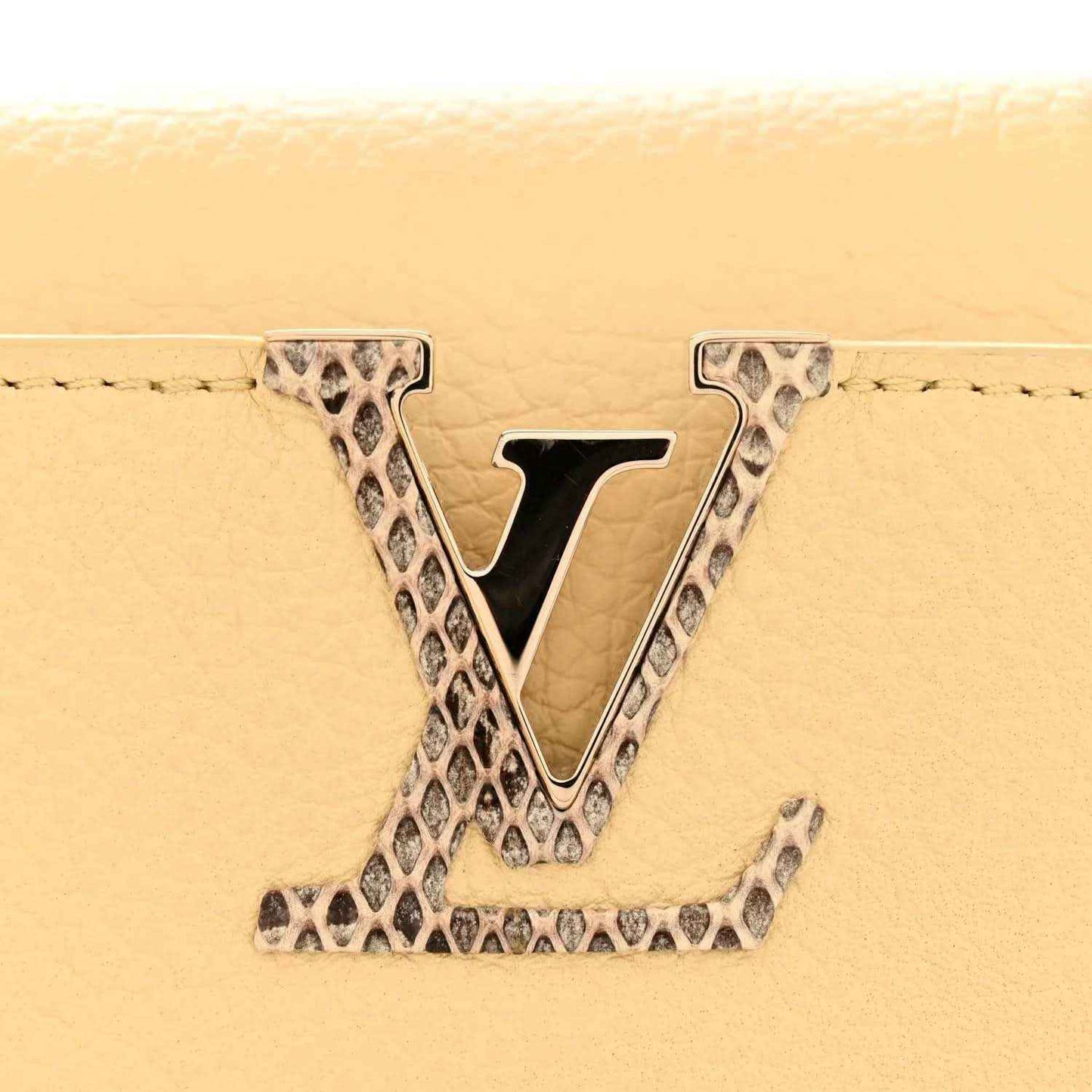 Louis Vuitton Mini Capucines handbag with V logo in snakeskin trim, beige