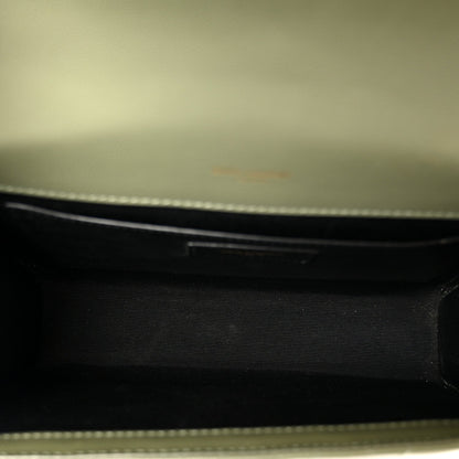 Dark leather satchel interior lining with zipper edge detail