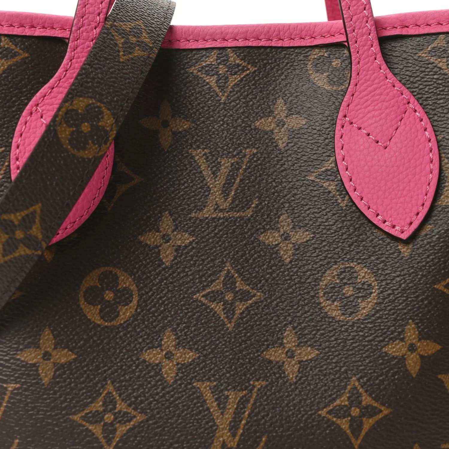 Louis Vuitton monogram tote bag close-up of pink leather handle and strap