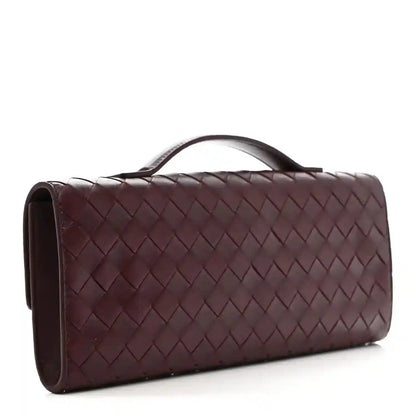 Bottega Veneta intrecciato leather clutch with top handle, dark burgundy finish