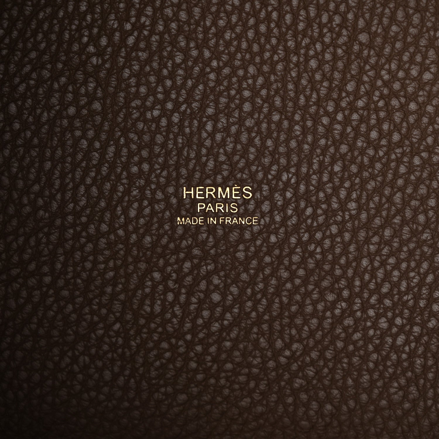 Taupe leather bag panel with Hermes Paris made in France stamp.