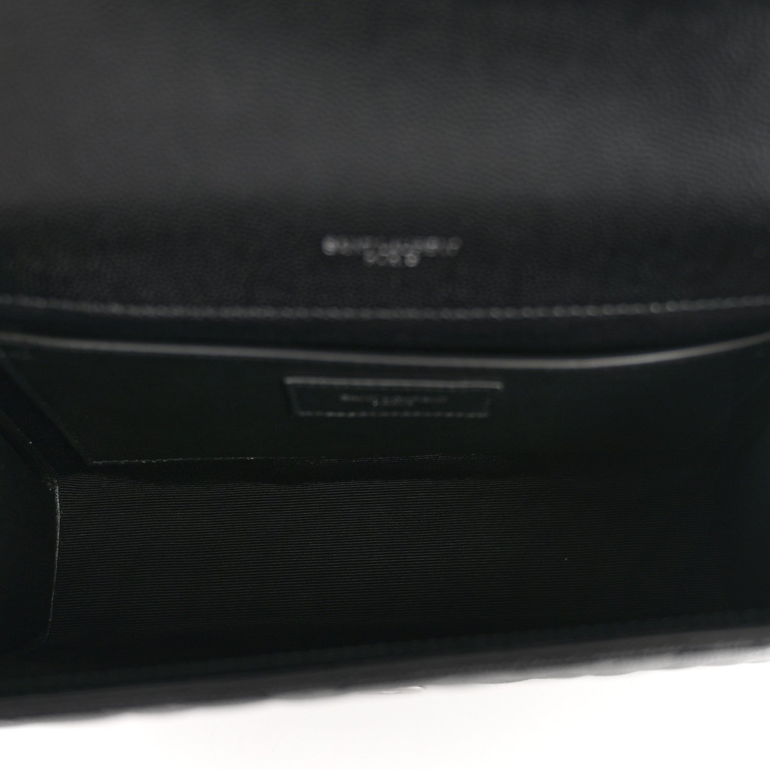 Black interior lining with stamped brand mark and pocket label