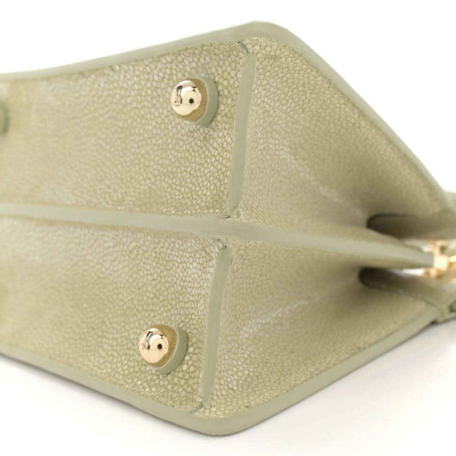 Fendi light green leather satchel interior detail with snap buttons and edge trim