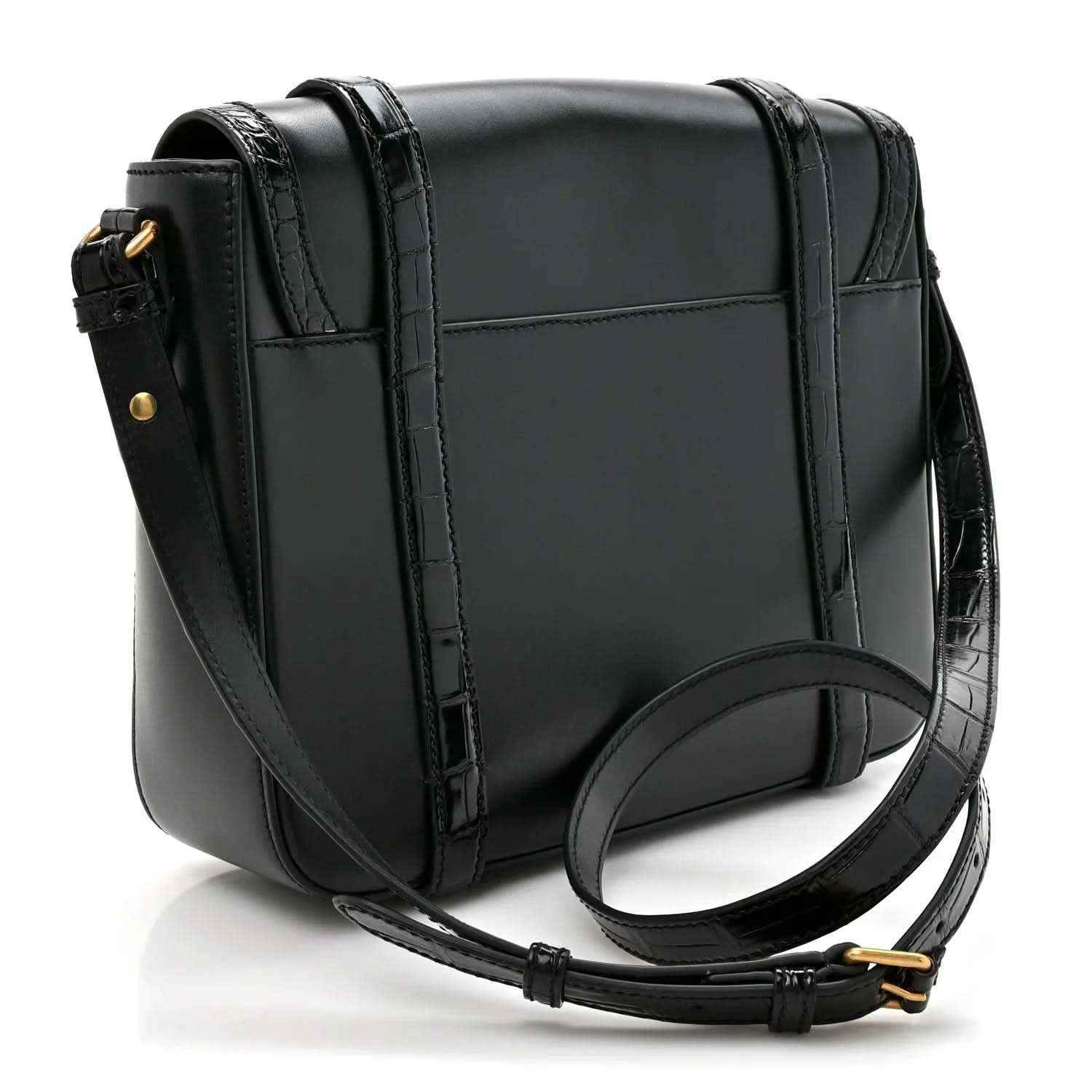 Black leather medium messenger bag with curved flap and adjustable strap