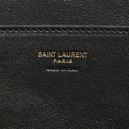 Black leather interior label reading SAINT LAURENT PARIS