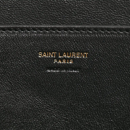 Black leather interior label reading SAINT LAURENT PARIS