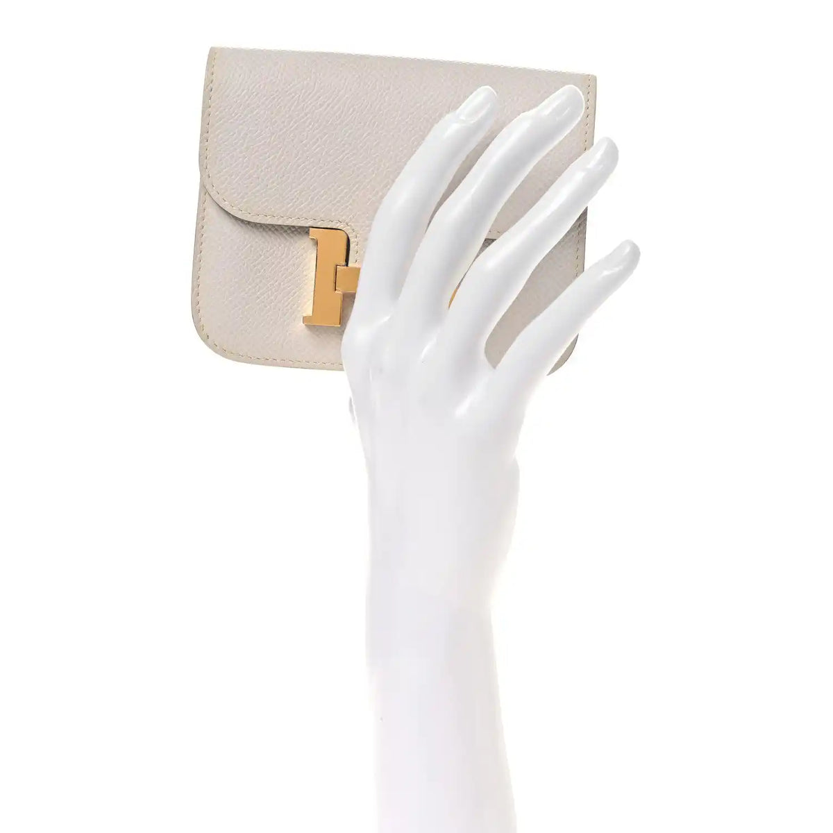 Pale gray leather slim wallet with open card slots and gold-tone H clasp