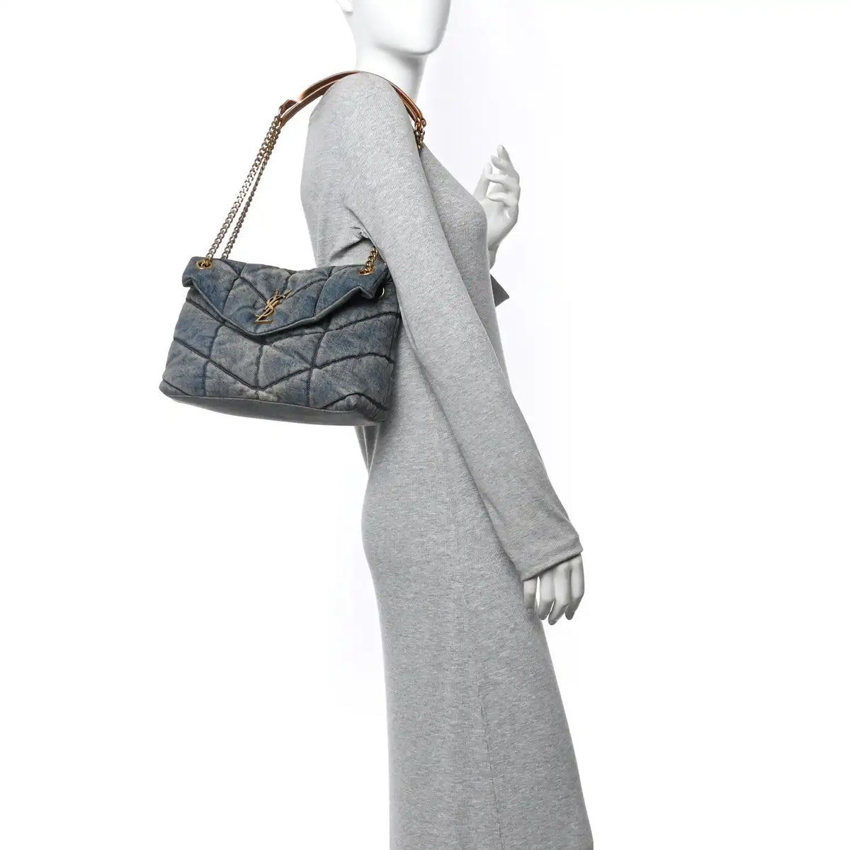 Denim quilted puffer satchel with chain shoulder strap and tan leather trim