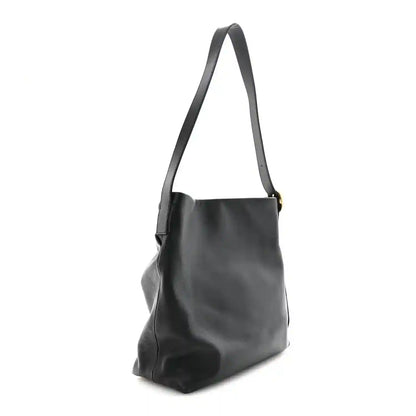 Black leather mini tote bag with wide shoulder strap and gathered front