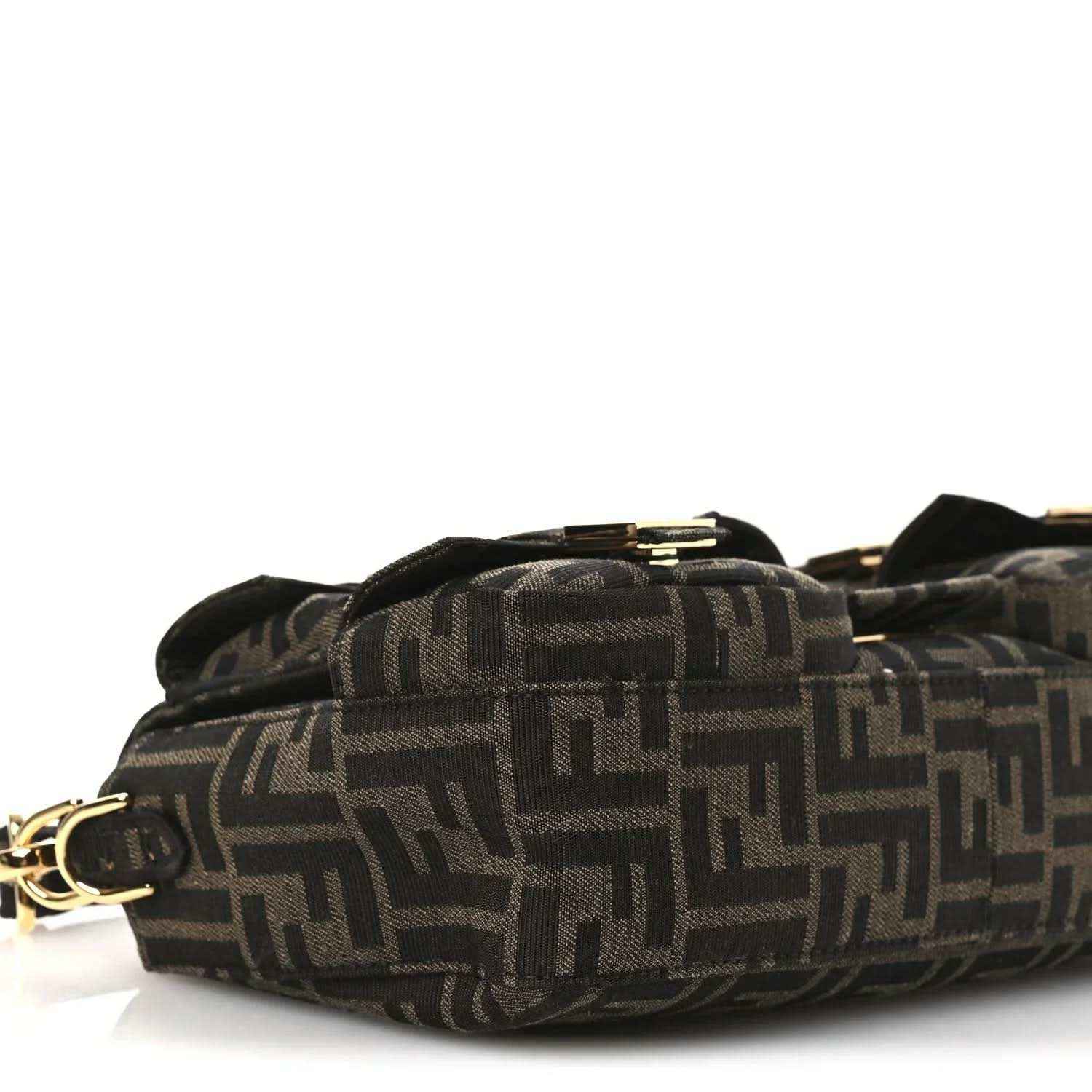 Fendi FF jacquard baguette bag close-up from side, dark brown patterned fabric and clasp