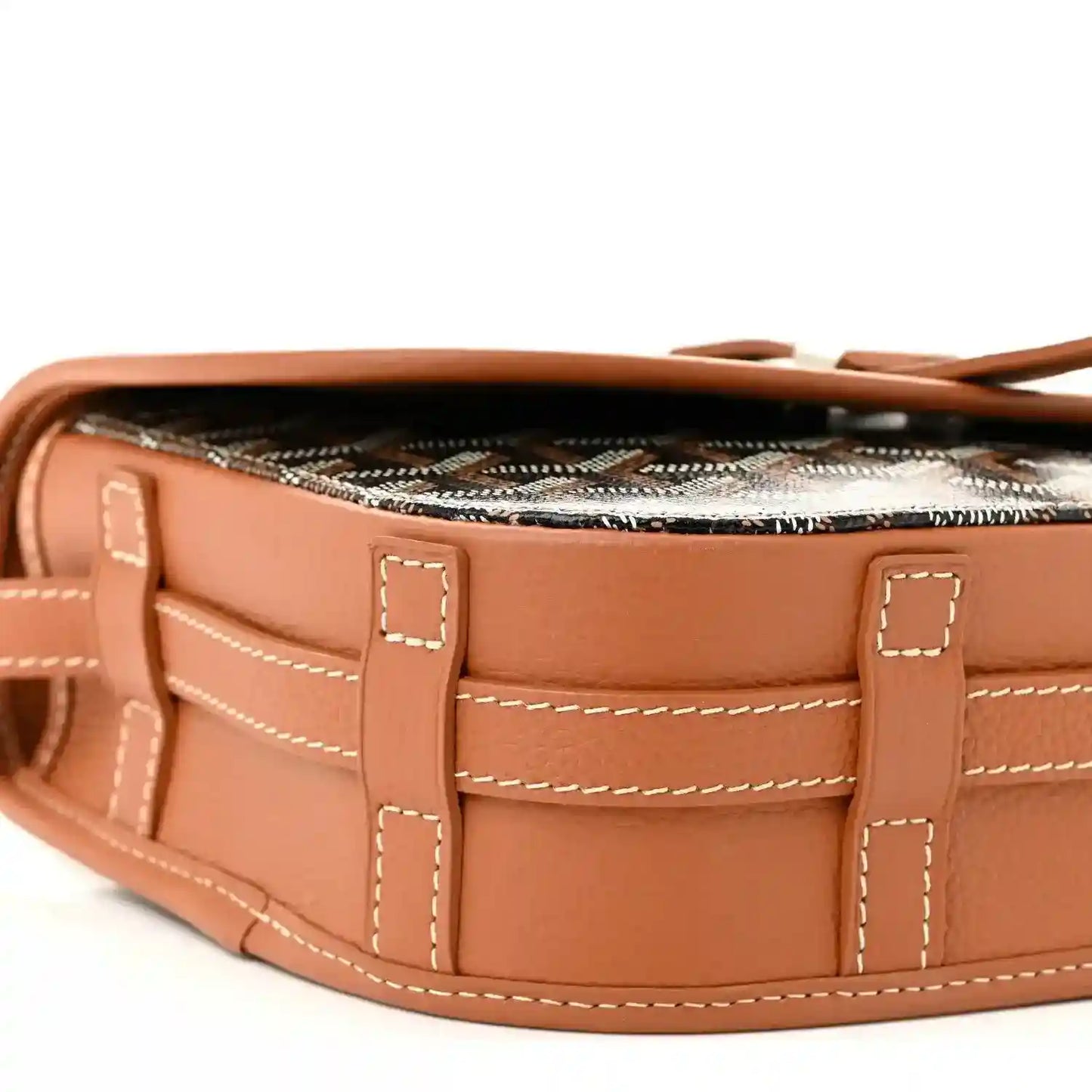 Tan leather messenger bag front panel with stitched pockets and clasp details