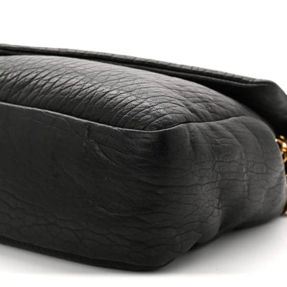 Saint Laurent Calypso shoulder bag, black grained lambskin, textured panel close-up