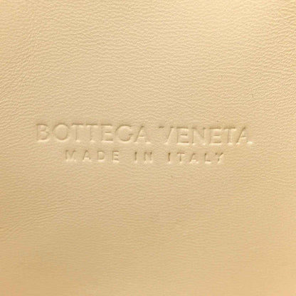 White leather clutch with Bottega Veneta embossed text and Made in Italy