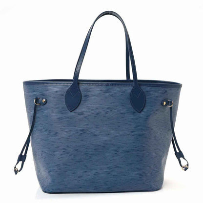 Denim blue leather tote bag with dual top handles and front snap pocket