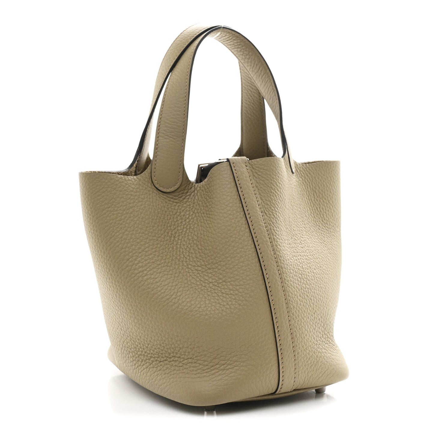 Beige leather tote bag with top handles and front lock closure, angled view