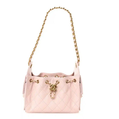 Chanel light pink quilted caviar mini 25 handbag with gold chain and front clasp