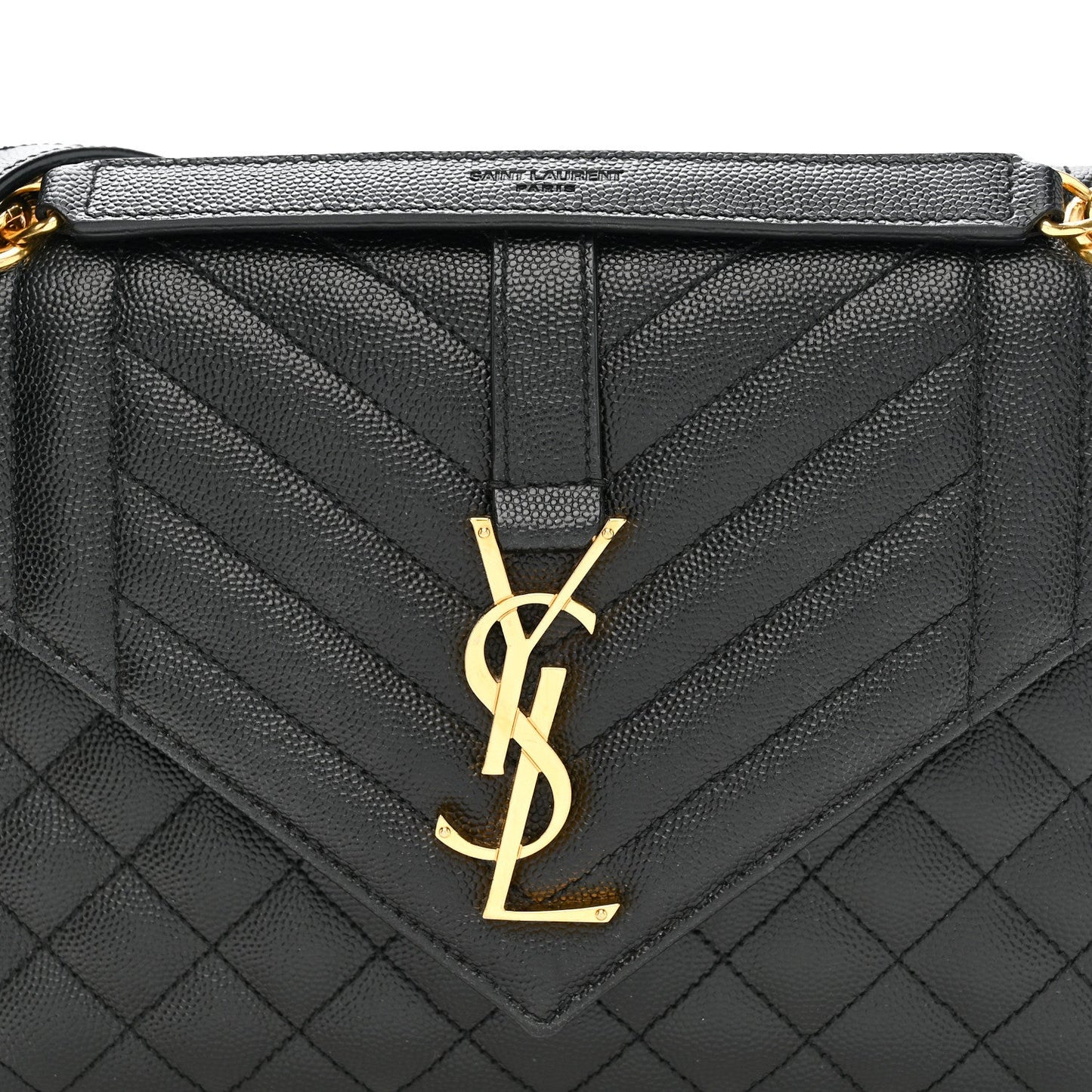 Black quilted satchel with front YSL monogram plaque and top handle trim