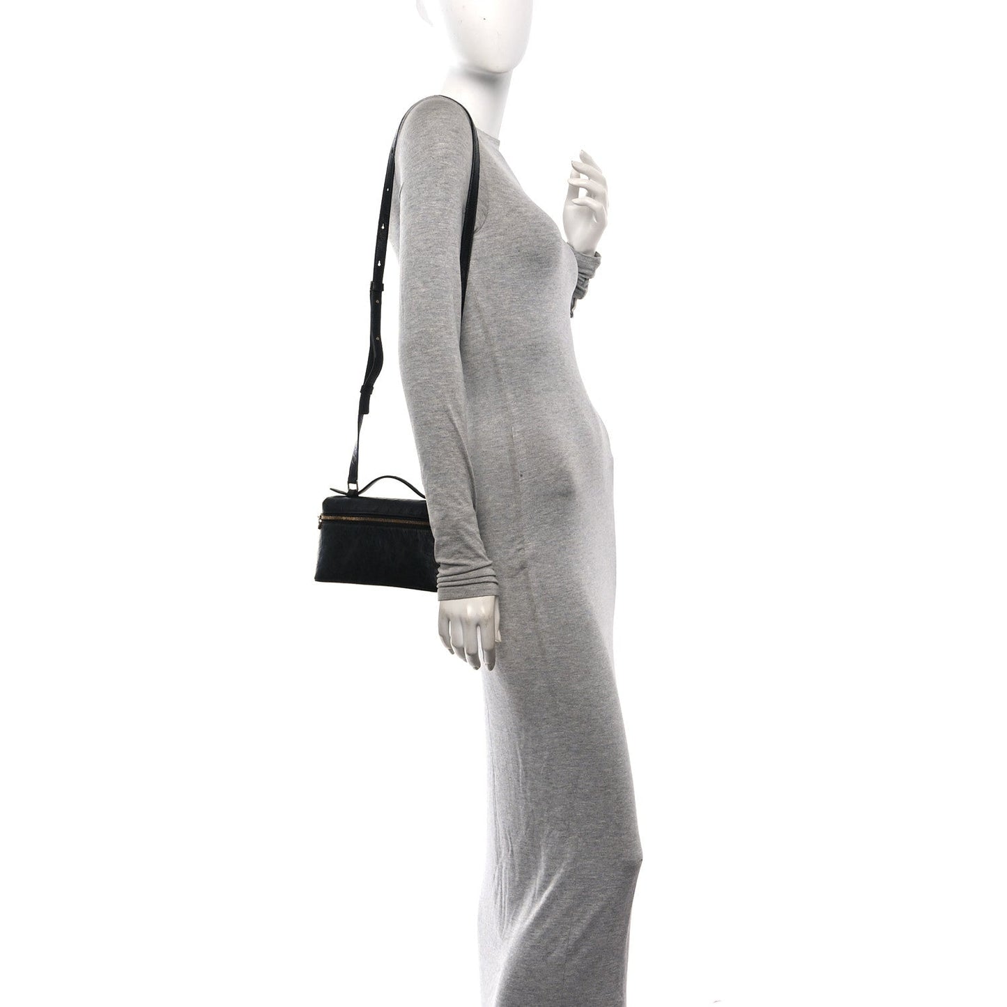 Black ostrich pocket pouch with shoulder strap worn at side on model