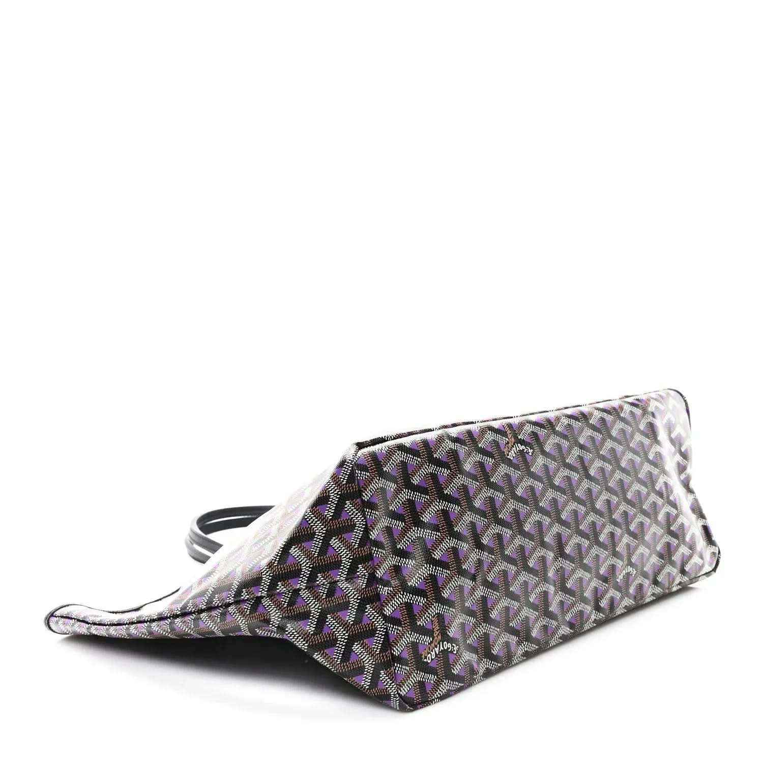 Tote bag corner view, monogram pattern fabric, light base with dark and purple accents