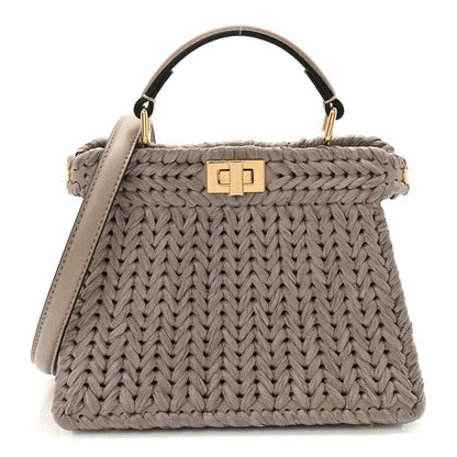 Gray woven raffia and leather satchel with top handle and gold clasp
