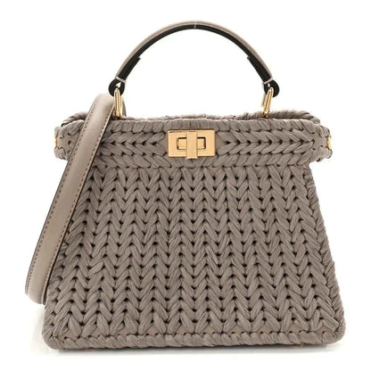 Gray woven raffia and leather satchel with top handle and gold clasp