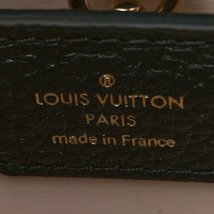 Leather bag lining with embossed "LOUIS VUITTON PARIS" and "made in France"