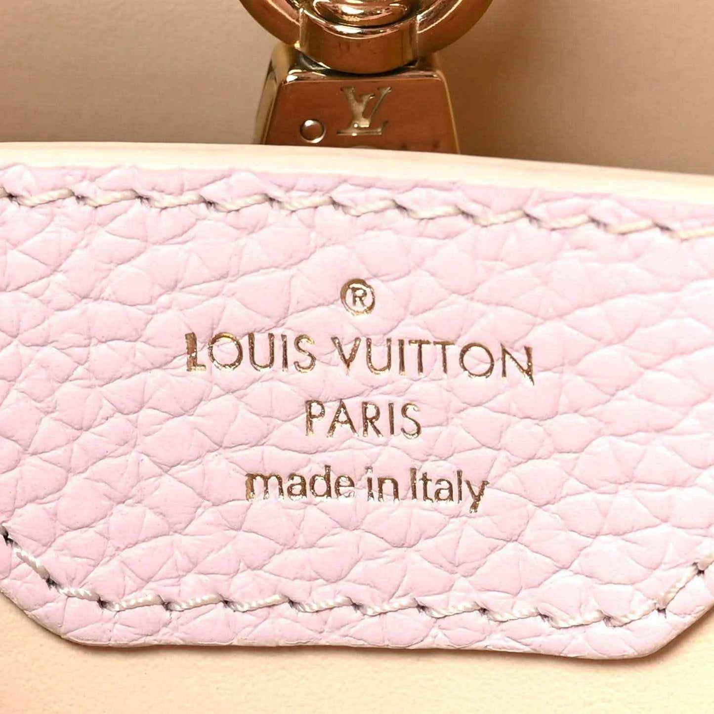 Pink quilted leather lining with Louis Vuitton Paris stamp and made in Italy