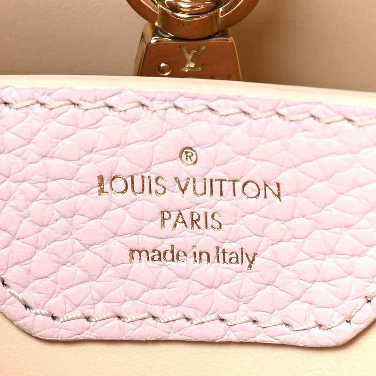 Pink quilted leather lining with Louis Vuitton Paris stamp and made in Italy