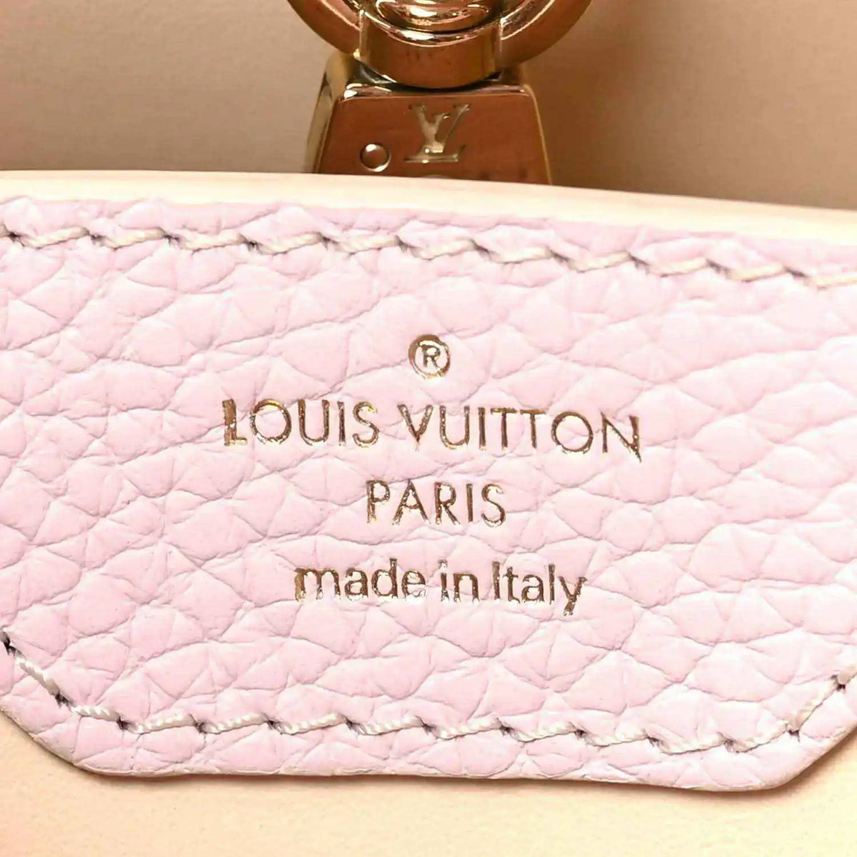 Pink quilted leather lining with Louis Vuitton Paris stamp and made in Italy