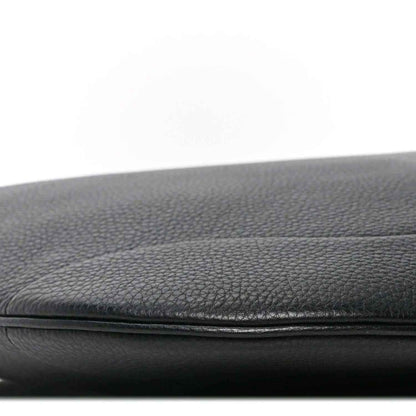 Black grained leather bag edge with stitched seam