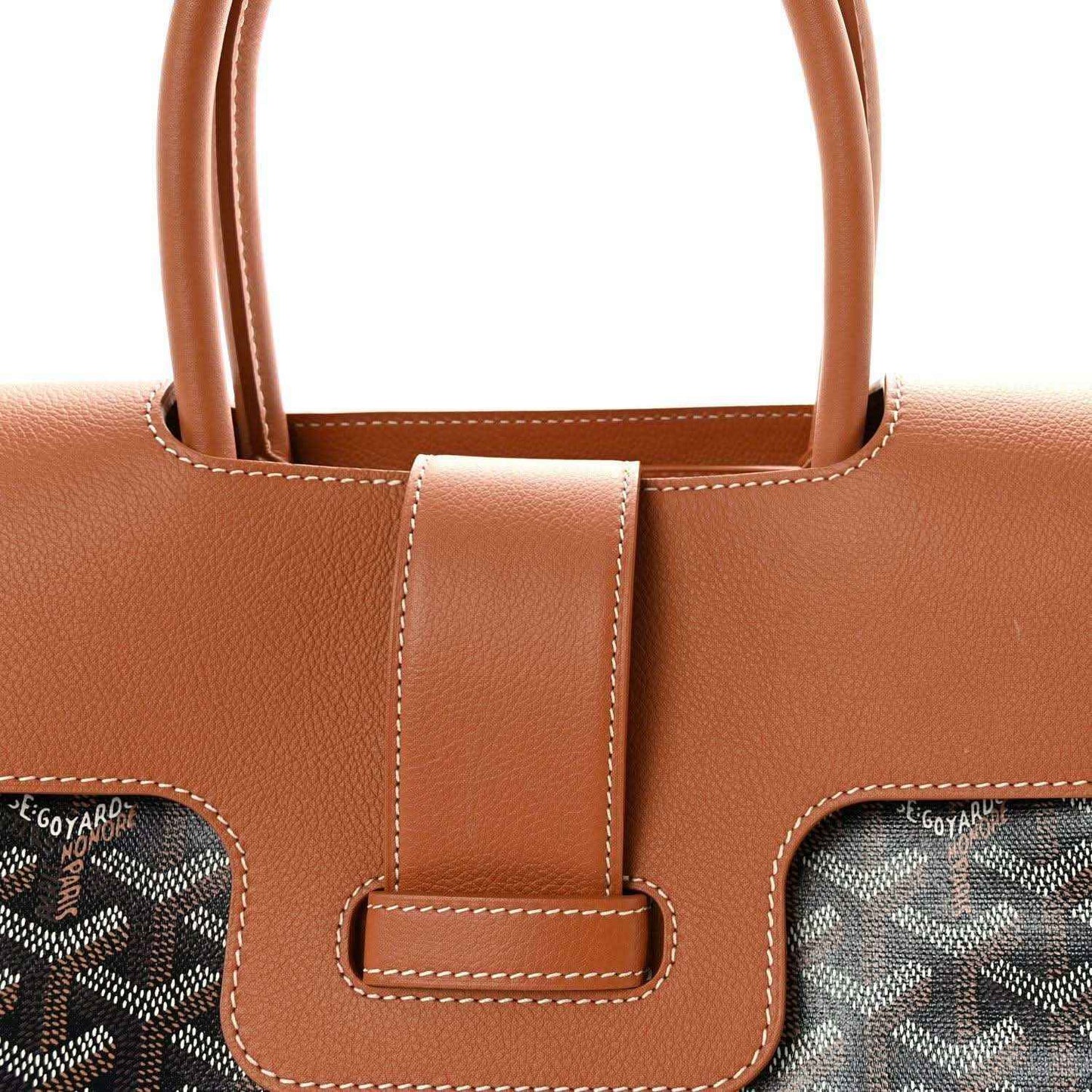 Goyard Saigon tote handbag top view with tan leather handle and center strap detail