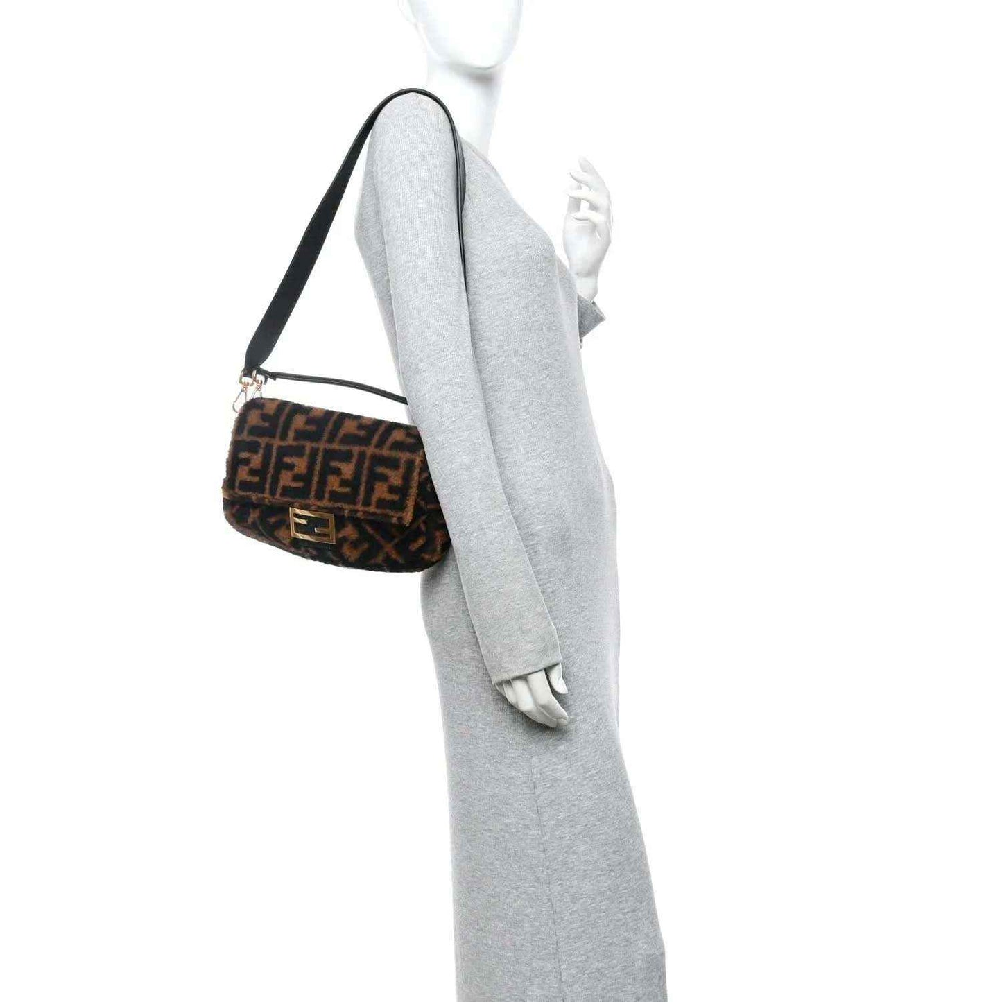 Shearling Baguette bag with FF logo, tobacco-and-black pattern, shoulder strap.