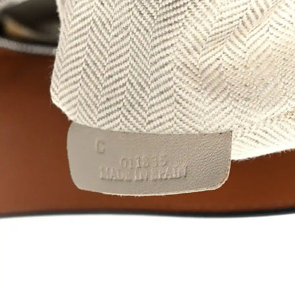 Loewe tan calfskin small Puzzle shoulder bag interior tag reading "Made in Spain"