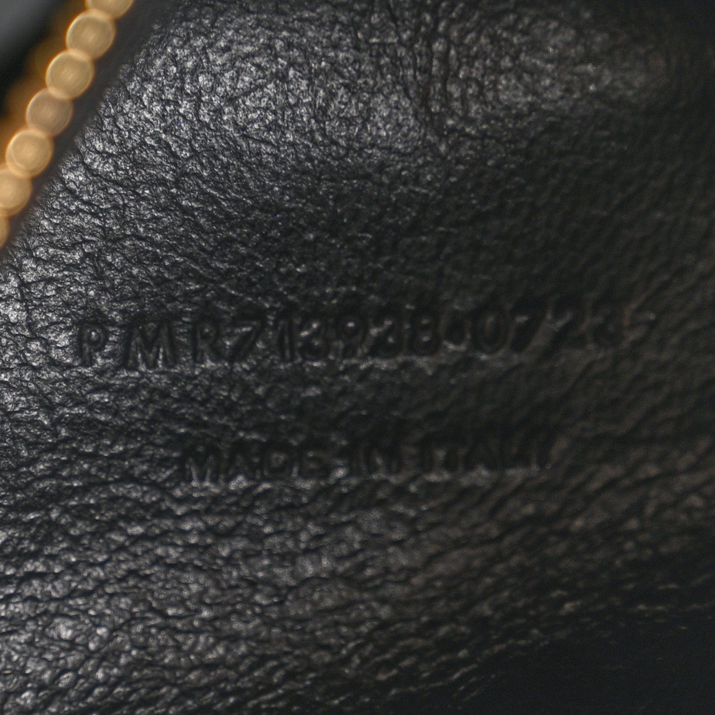 Black leather hobo bag with printed code and MADE IN ITALY text
