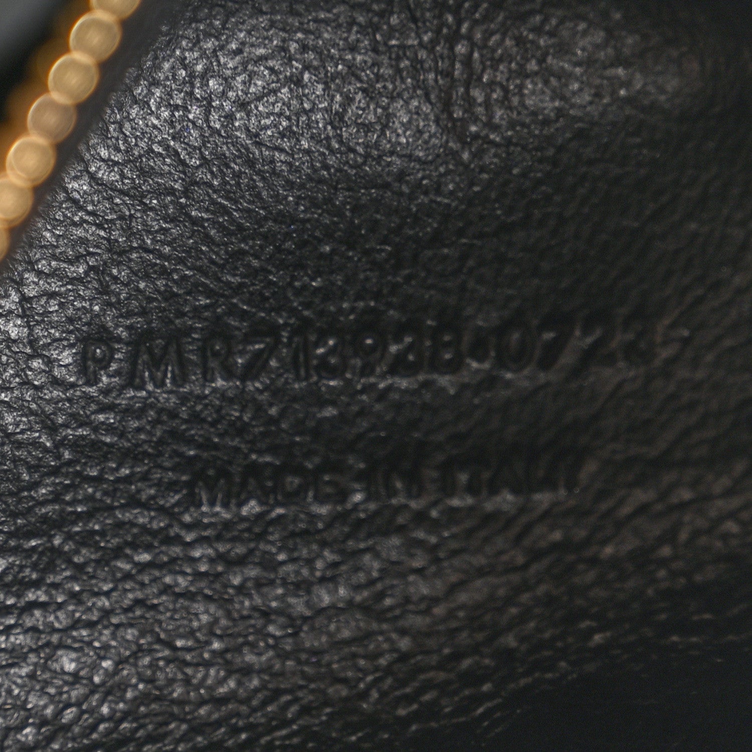 Black leather hobo bag with printed code and MADE IN ITALY text