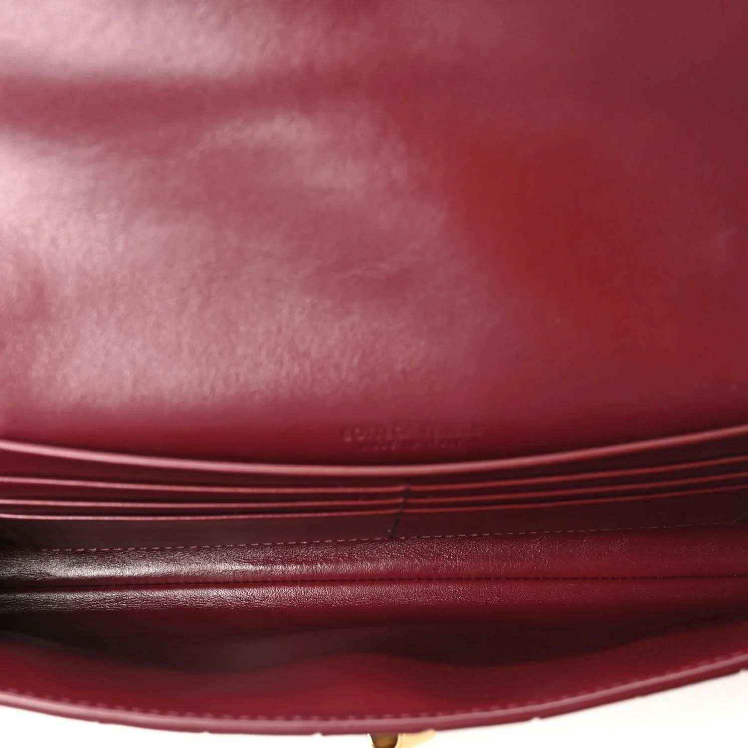 Bottega Veneta long clutch interior with smooth leather lining in barolo
