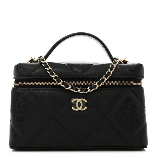 Black quilted leather slim vanity bag with gold chain, zipper top, and CC logo charm