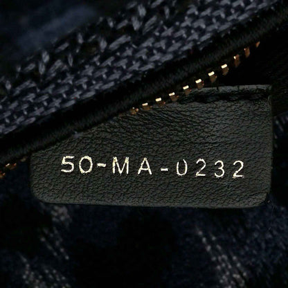 Christian Dior handbag code patch reading “50-MA-0232”