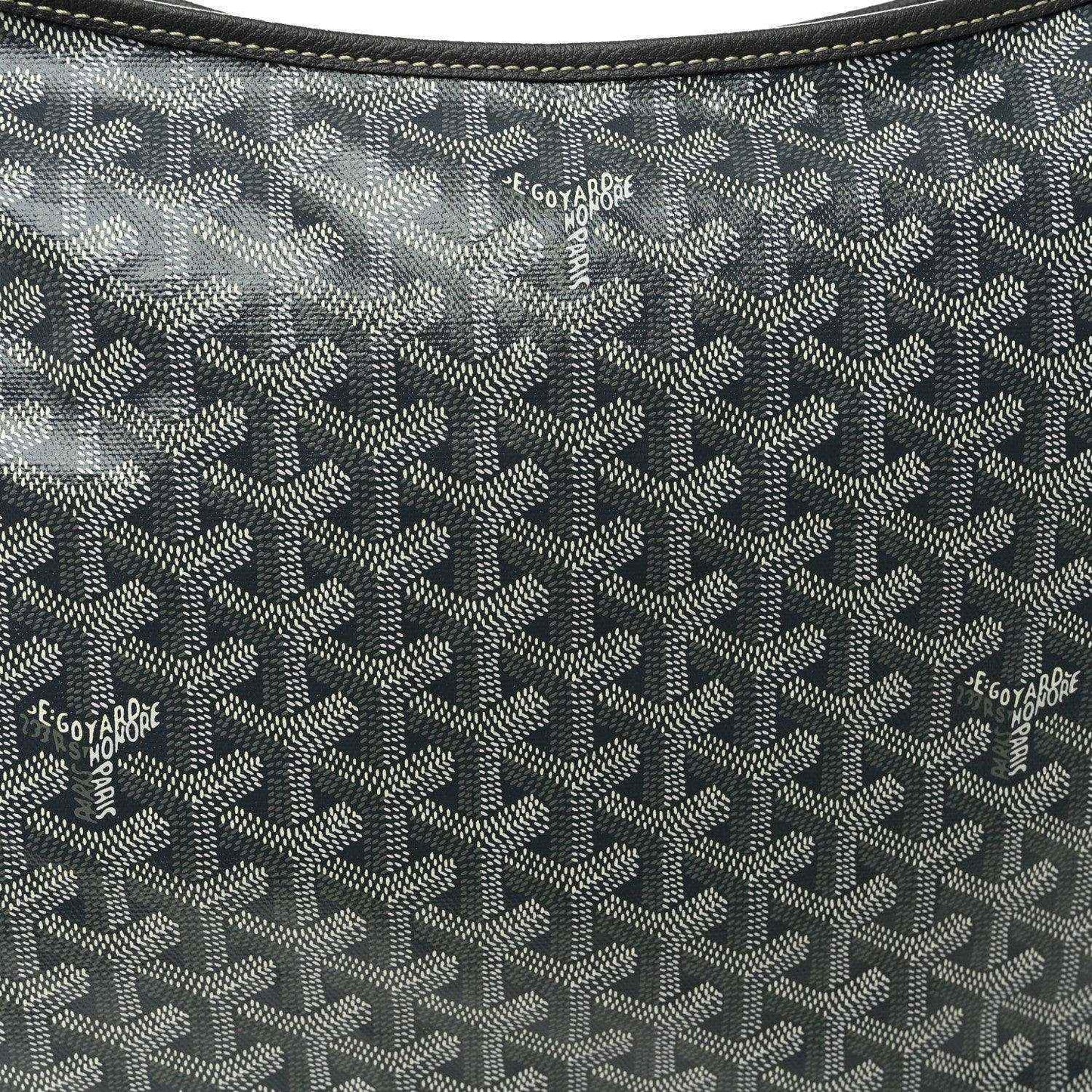Grey canvas hobo bag with repeating Goyardine logo pattern and small labels