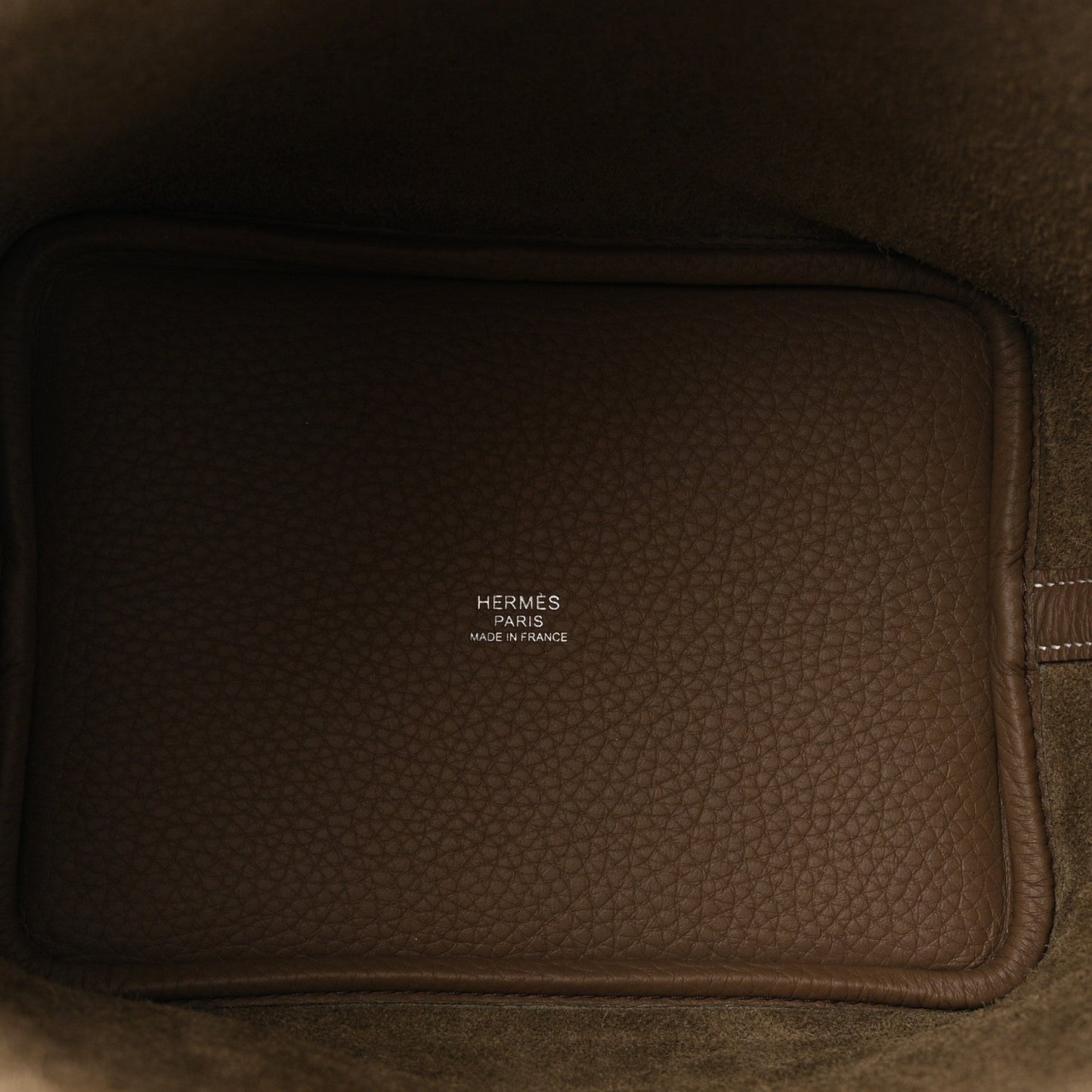 Leather bag interior panel with HERMES PARIS MADE IN FRANCE stamp