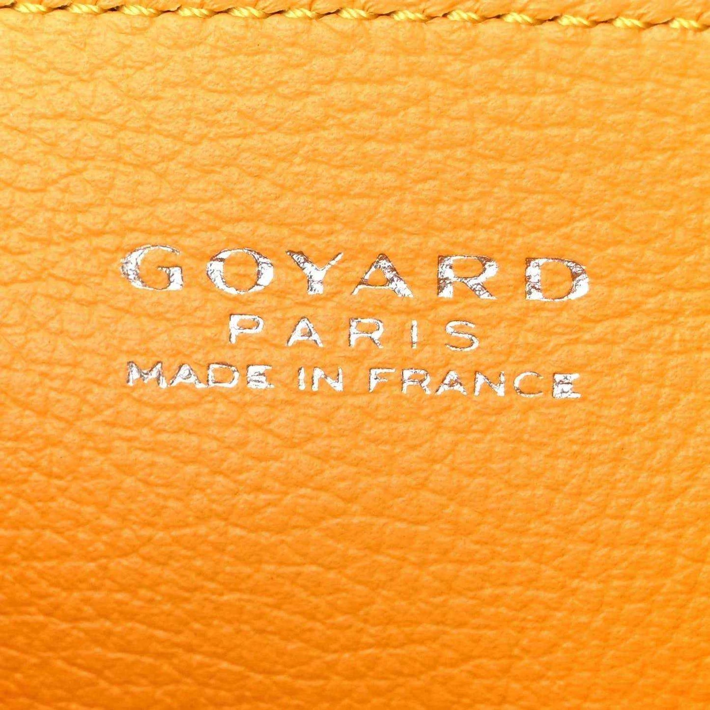 Goyard Paris leather label reading 'Made in France'.