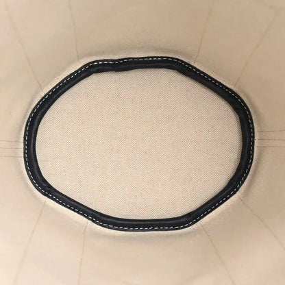 Navy tote bag base panel with stitched border around the bottom