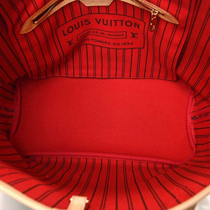 Louis Vuitton tote interior, red fabric lining with Louis Vuitton logo label